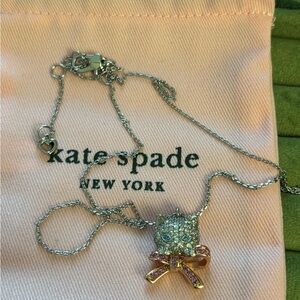 NWOT kate spade silver-tone crystal necklace with pink and gold bow